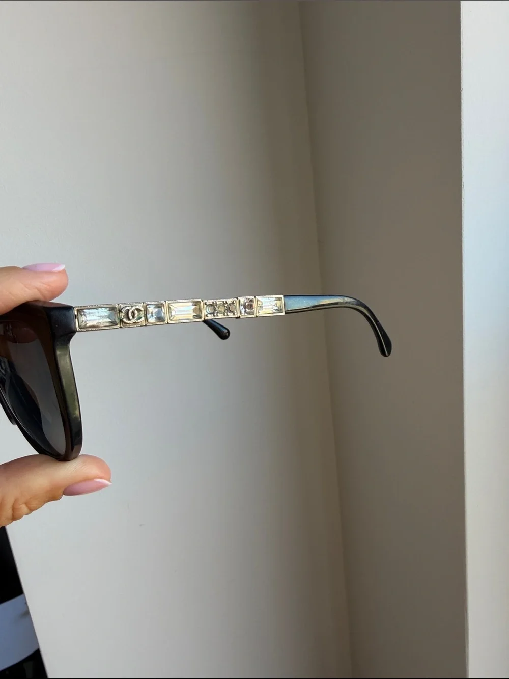 CHANEL Black Cat-Eye Sunglasses with Silver Accents
